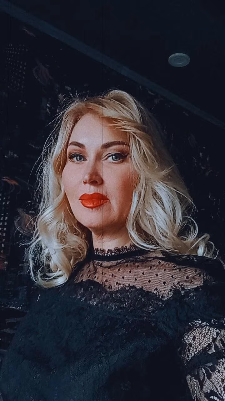 Open Woman's Profile