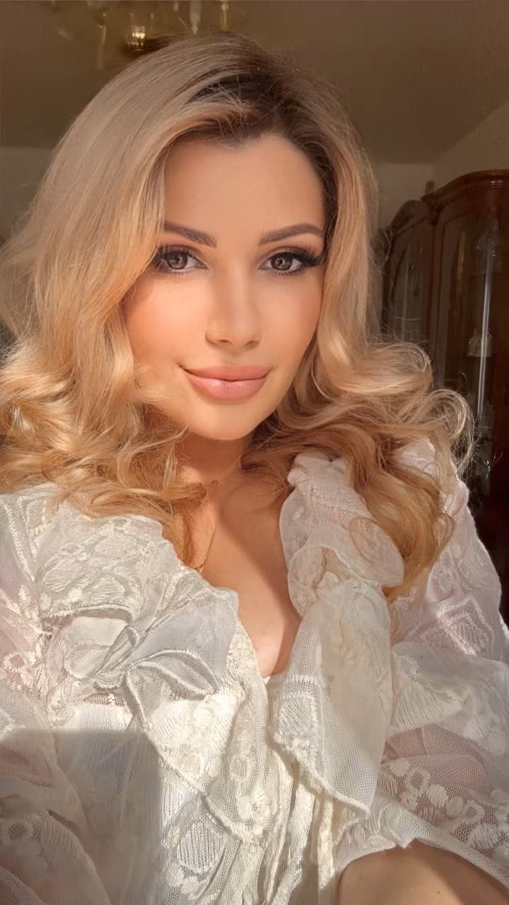 Open Woman's Profile