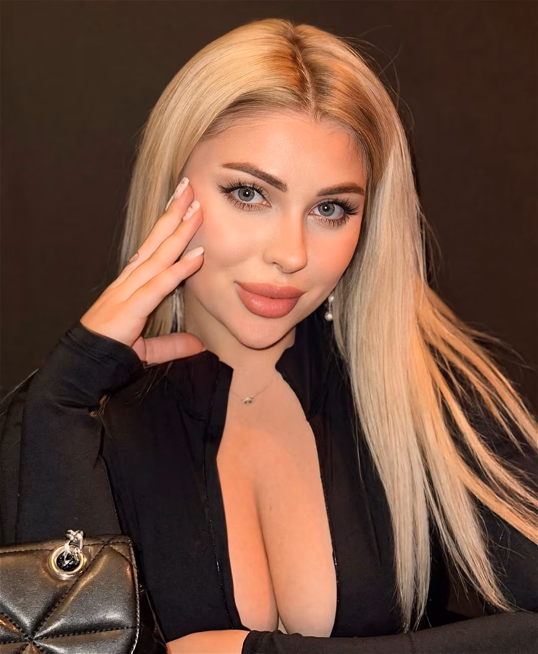 Open Woman's Profile